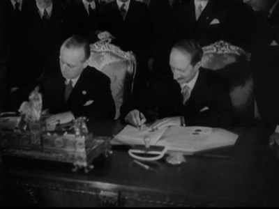 Joachim Ribbentrop y Georges Bonnet firman el Compromiso Franco-Alemán de Colaboración ‎Pacífica en 1938.‎