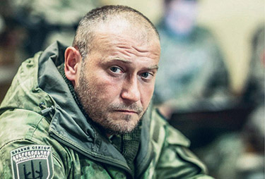 CC/Volodymyr Tverdokhlib Dmytro Yarosh, cofundador del Sector Derecho y comandante del Ejército de Voluntarios de Ucrania. En 2019 amenazó con que el presidente Zelenskyy "perdería la vida. Se colgará de algún árbol" si se aplicaba alguna parte de los Acuerdos de Minsk con Rusia.